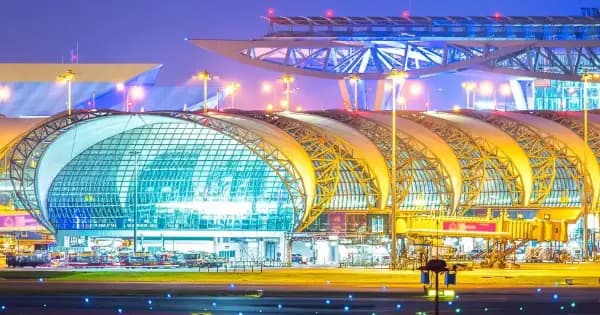 Suvarnabhumi Airport terminal in Bangkok at night as Thailand expands automated immigration gates to 31 more nationalities